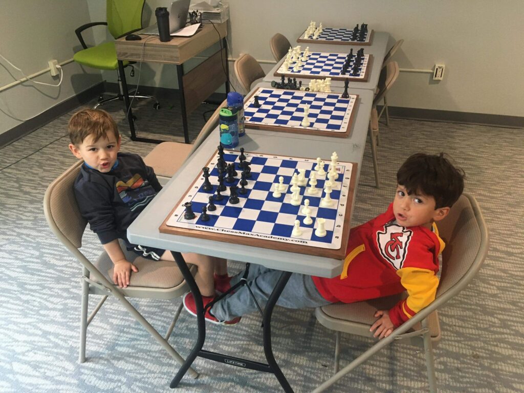 Children ready to play chess at Chess Max Academy Greenwich