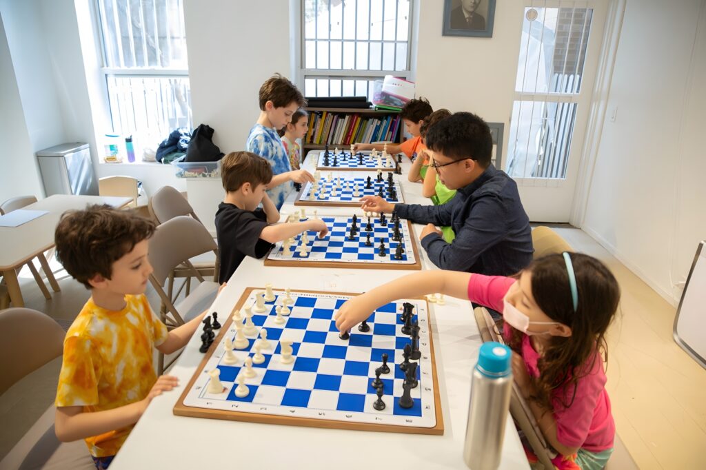 Children playing chess at Chess Max Academy Lex 93rd