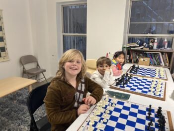 Kids playing chess at Chess Max Academy Upper East Side