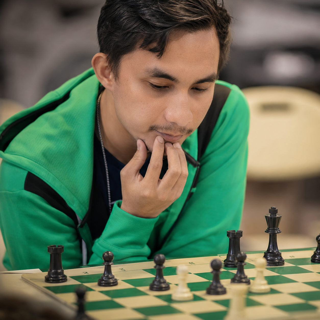 Jerich Cajeras analyzing a chess position at Chess Max Academy