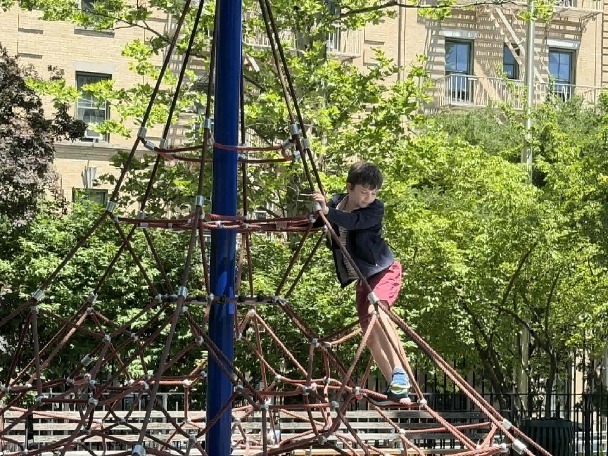 Camper climbing outside during an outdoor break