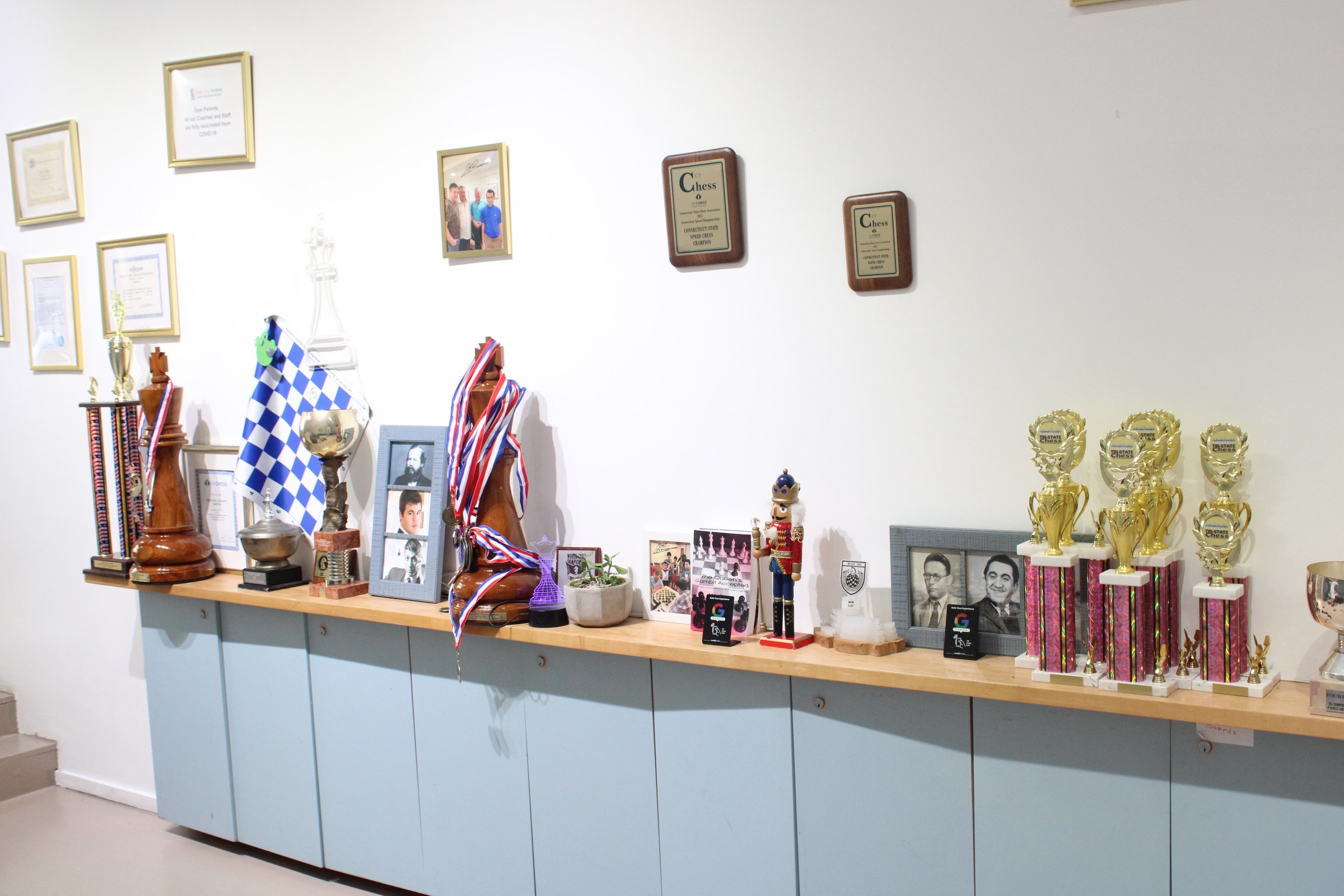 Chess trophies and awards displayed at Chess Max Academy on the Upper West Side