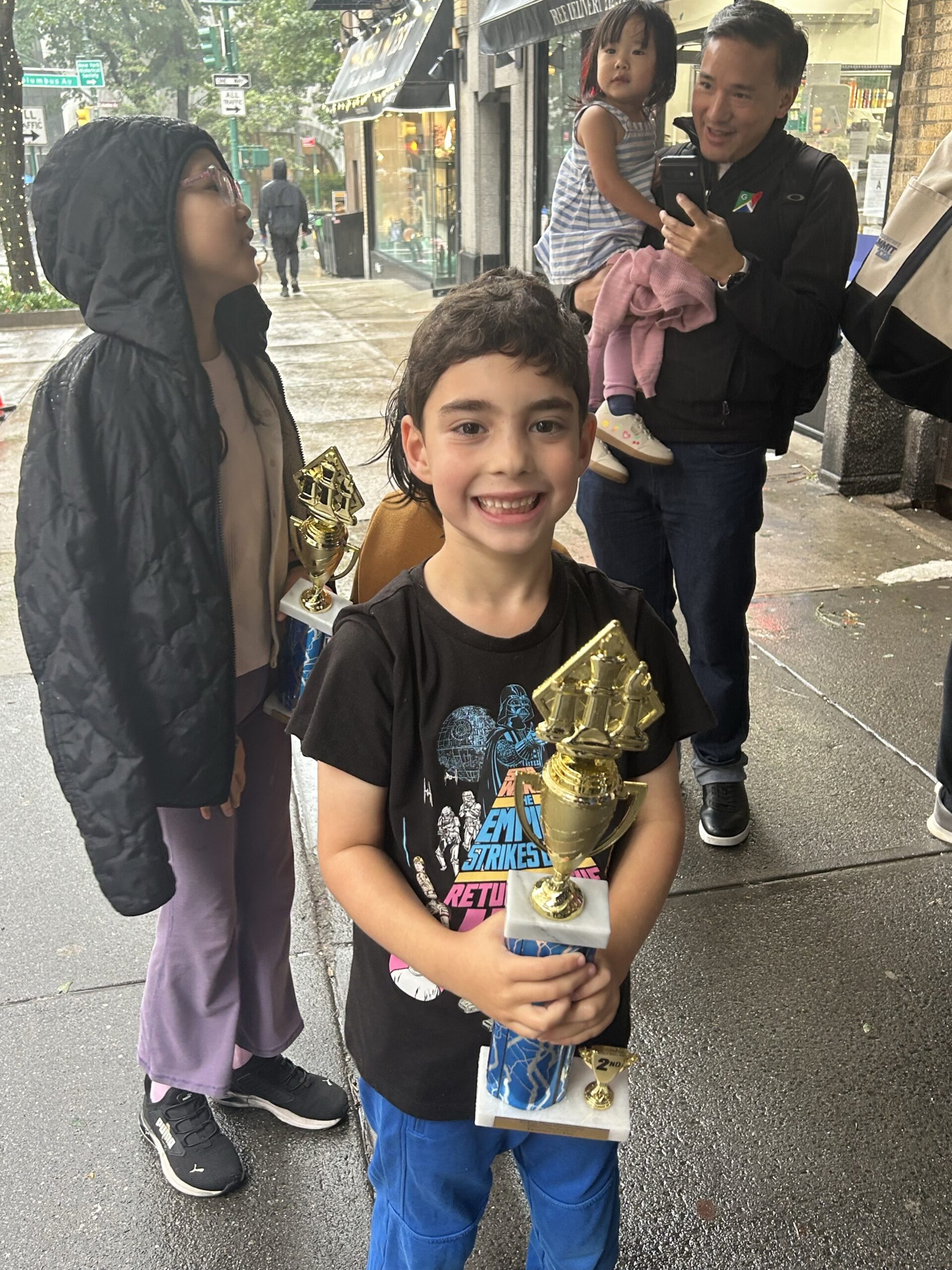 Asher Gonen with a chess trophy