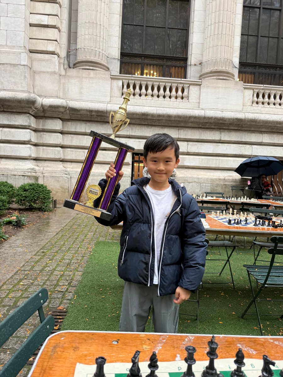 Jacob Hsu holding his Bryant Park trophy